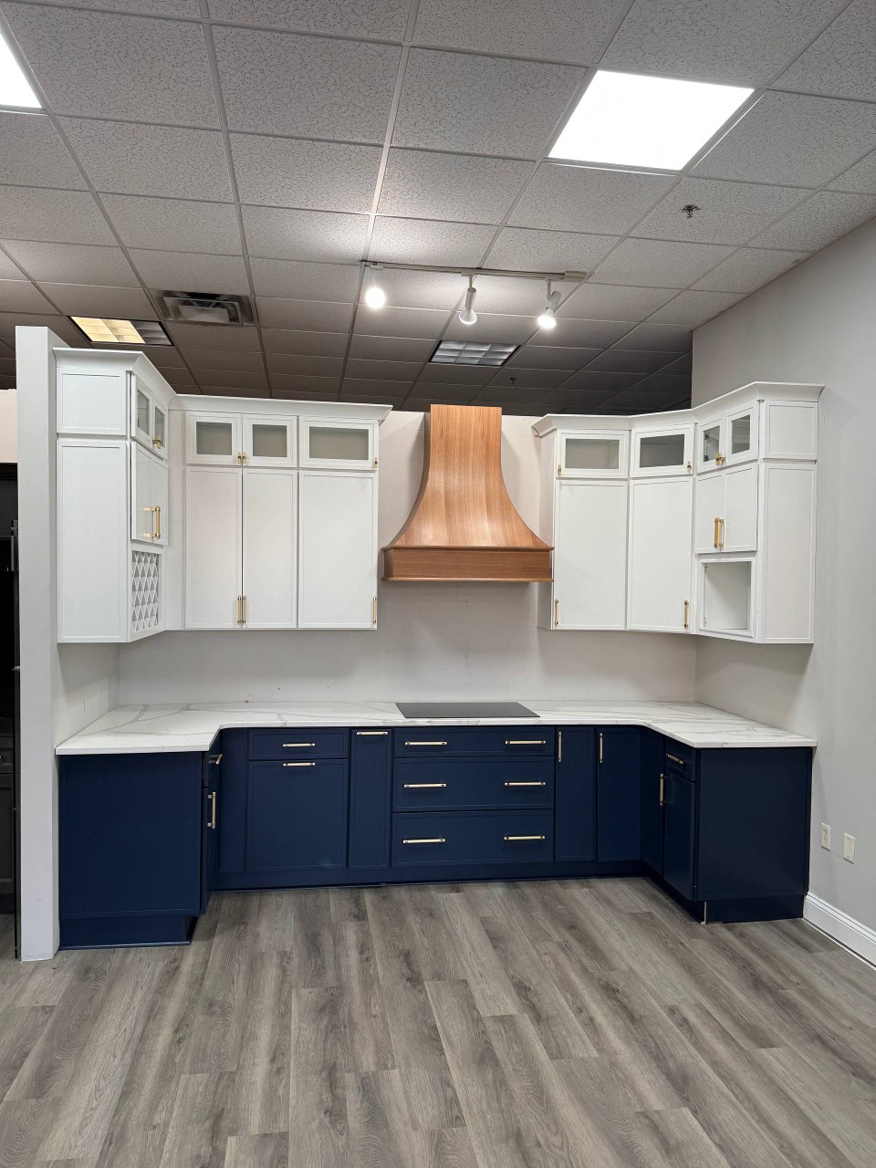 Modern White Kitchen with Herringbone Floors - After